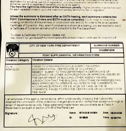 Photographed FDNY Supplemental Information Form with a Certificate of Occupancy violation entry
